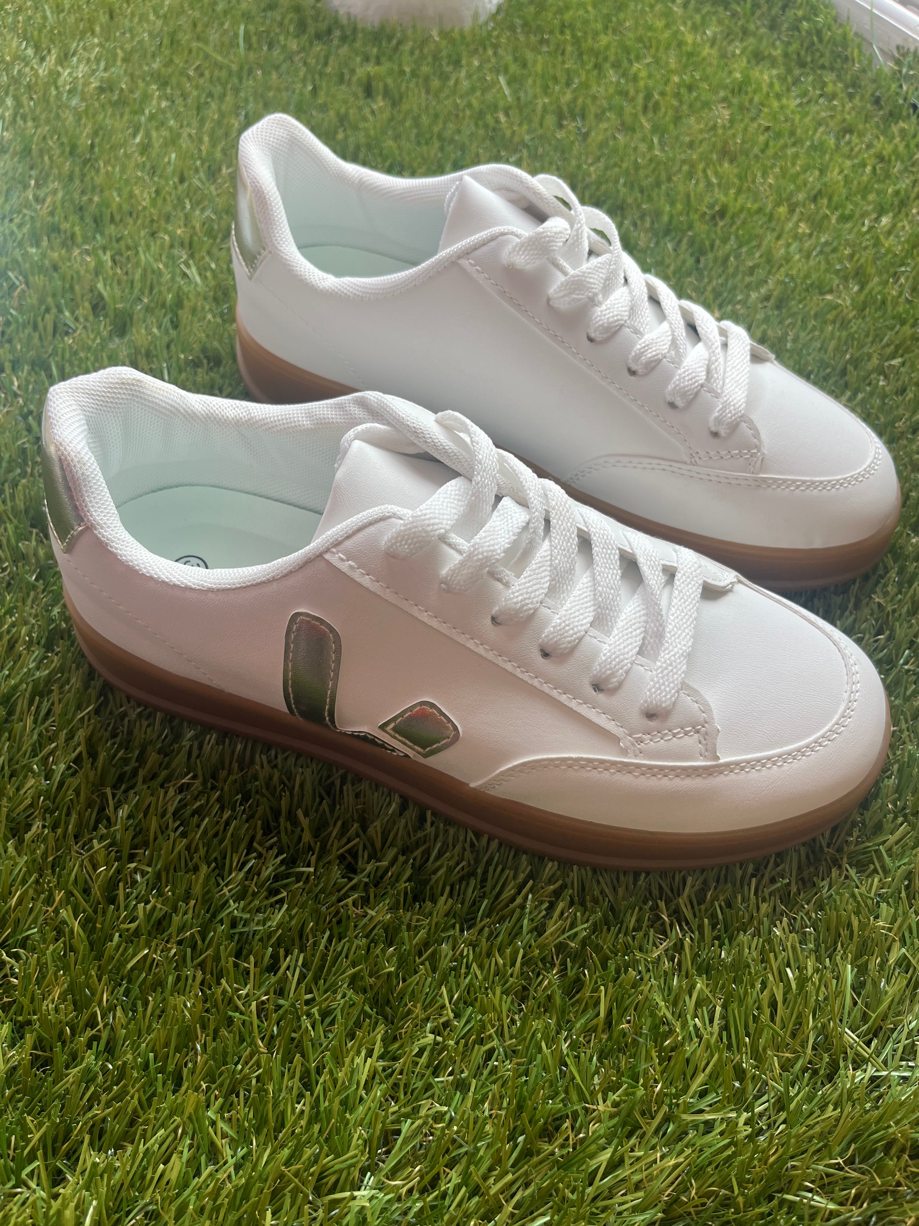 Aimee White and Gold Trainers